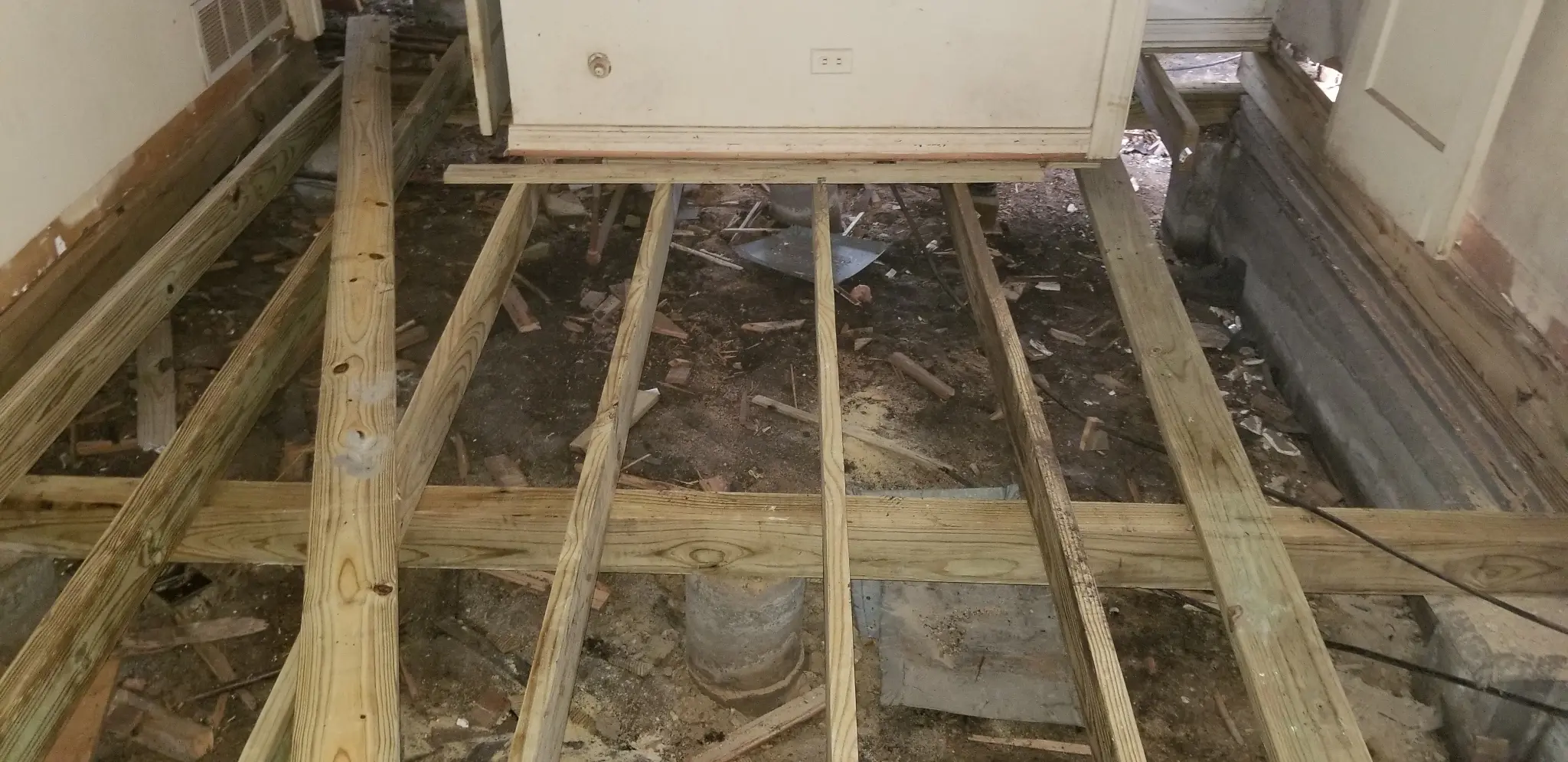 Garland TX house floor framing during full gut renovation - DFW I Buy Houses