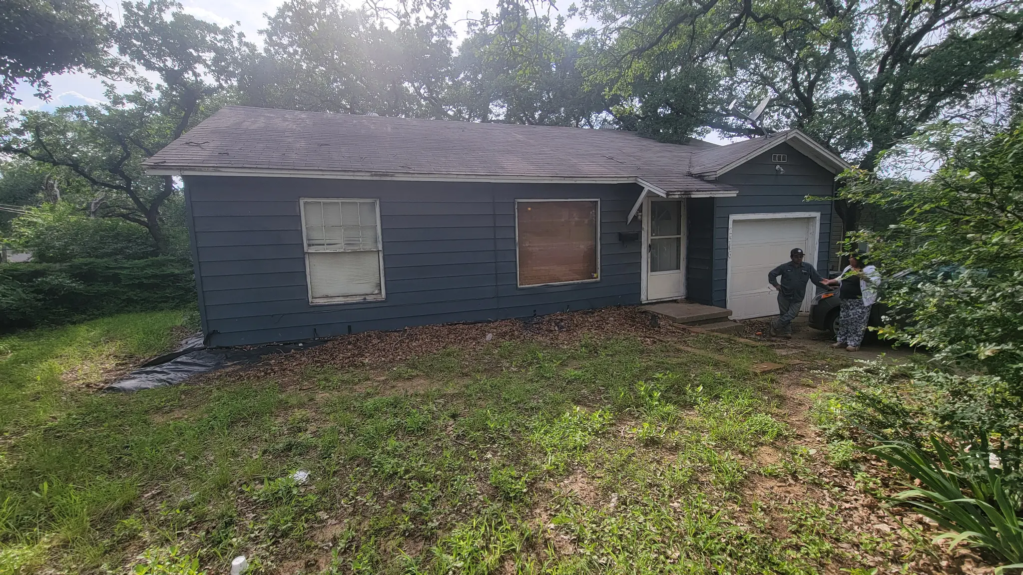 Benjamin Fort Worth property exterior — blue siding, as-is condition — DFW I Buy Houses