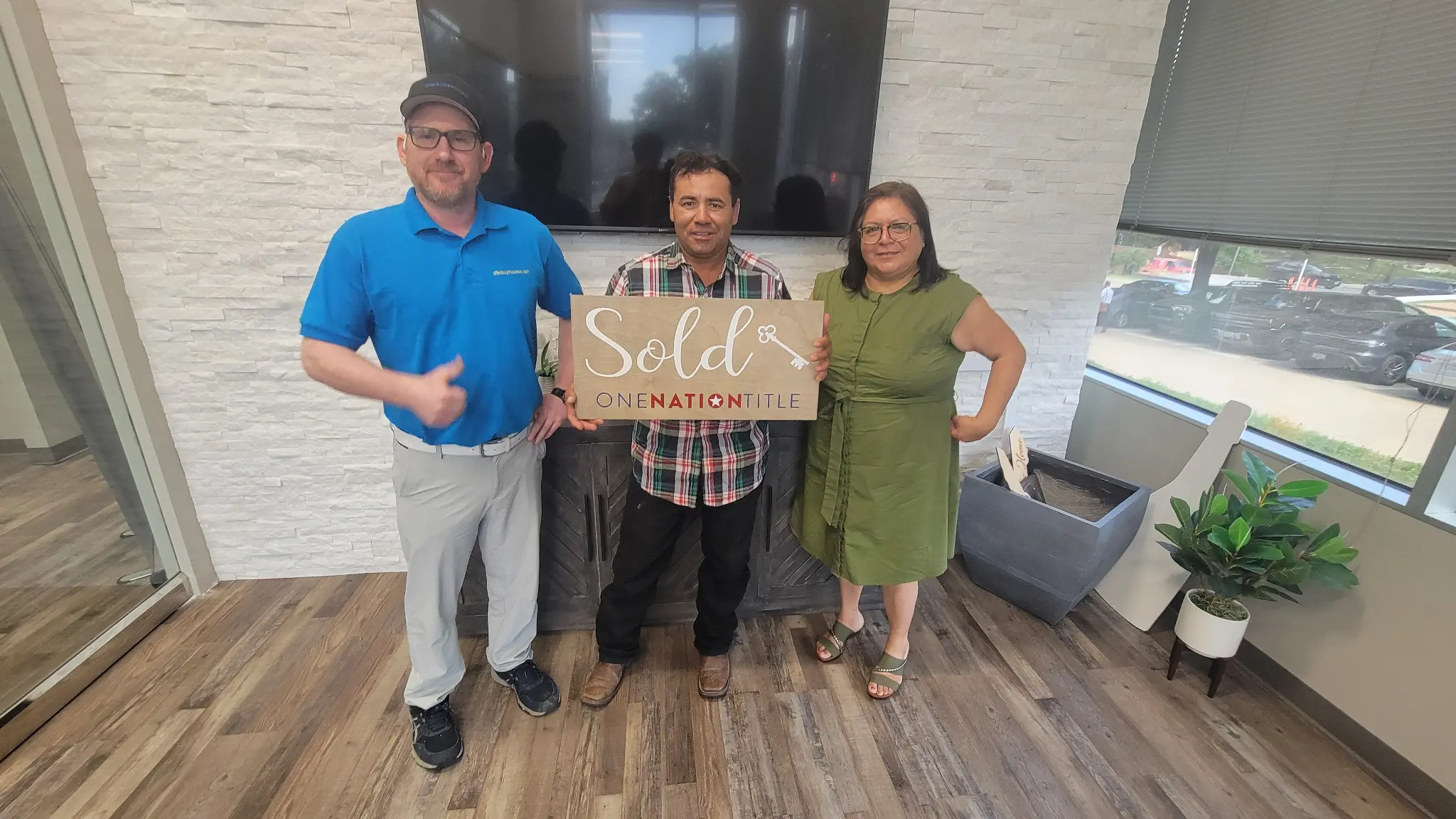 Shannan Coblentz and seller Benjamin at closing — Fort Worth TX cash home sale — DFW I Buy Houses