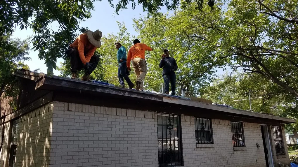 During: New roof installation underway