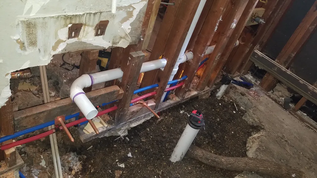 The plumbers had to run all new water lines and drains for the kitchen and bathroom