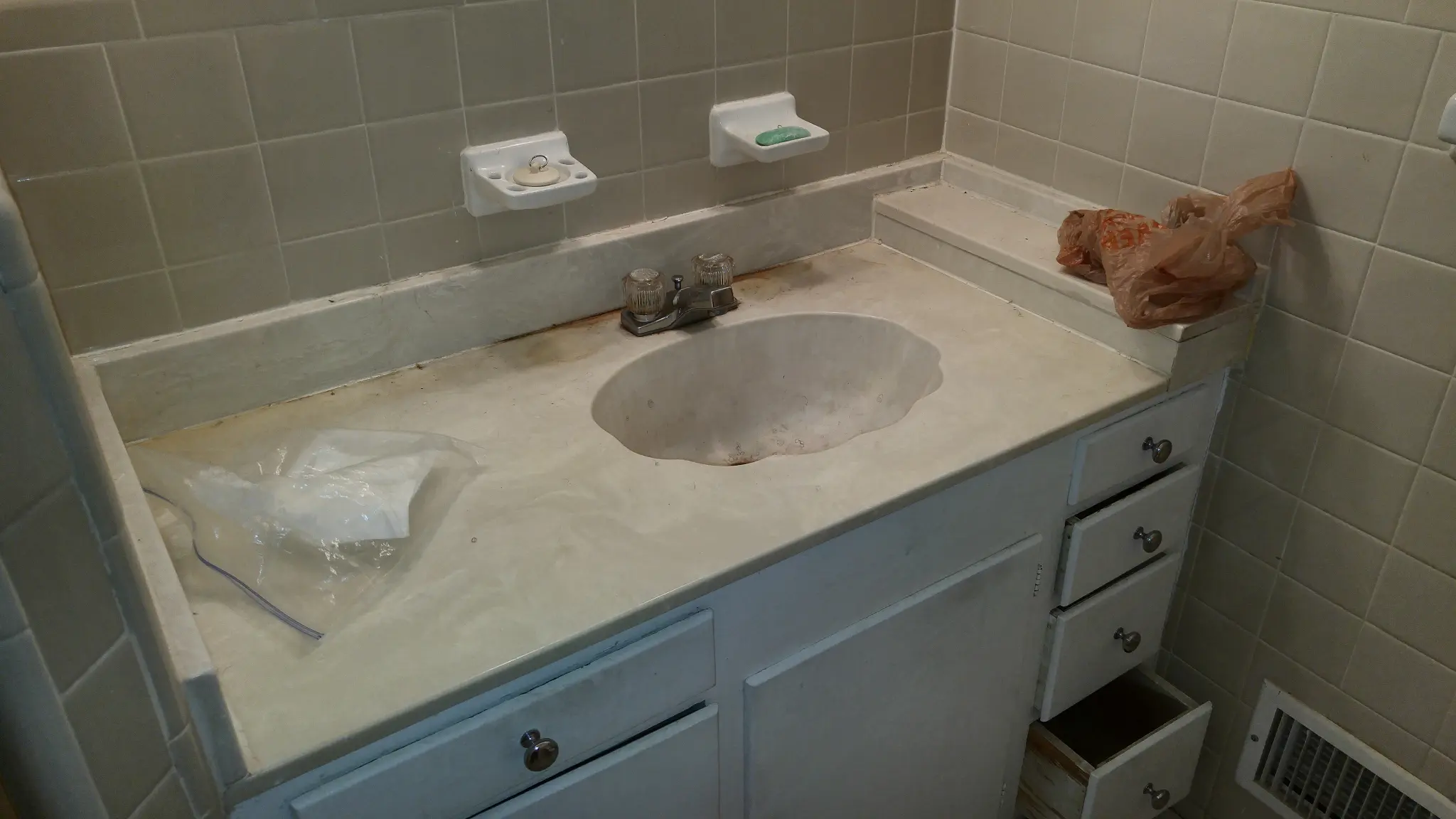 1823 Winthrop St Irving TX bathroom vanity dirty and dated before renovation - DFW I Buy Houses